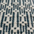 Teppich Lumaco in Petrol & Eierschale aus 100% Wolle | Entdecken Sie unsere schönsten Wohnaccessoires