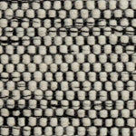 Wollteppich Kolong übergroß Eierschale & Schwarz, 100% Wolle | Hochwertige Wohnaccessoires