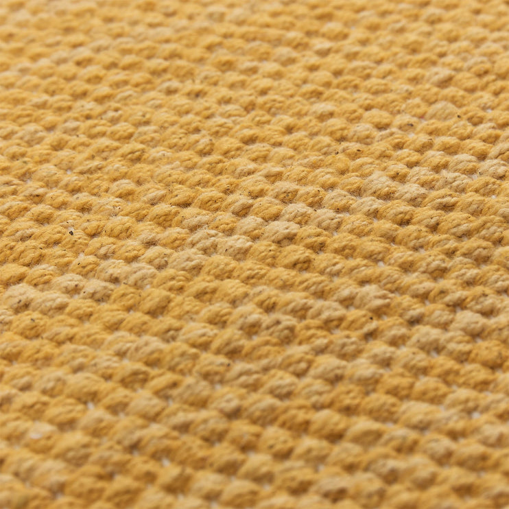 Teppich Akora in Senfgelb aus 100% Baumwolle | Entdecken Sie unsere schönsten Wohnaccessoires